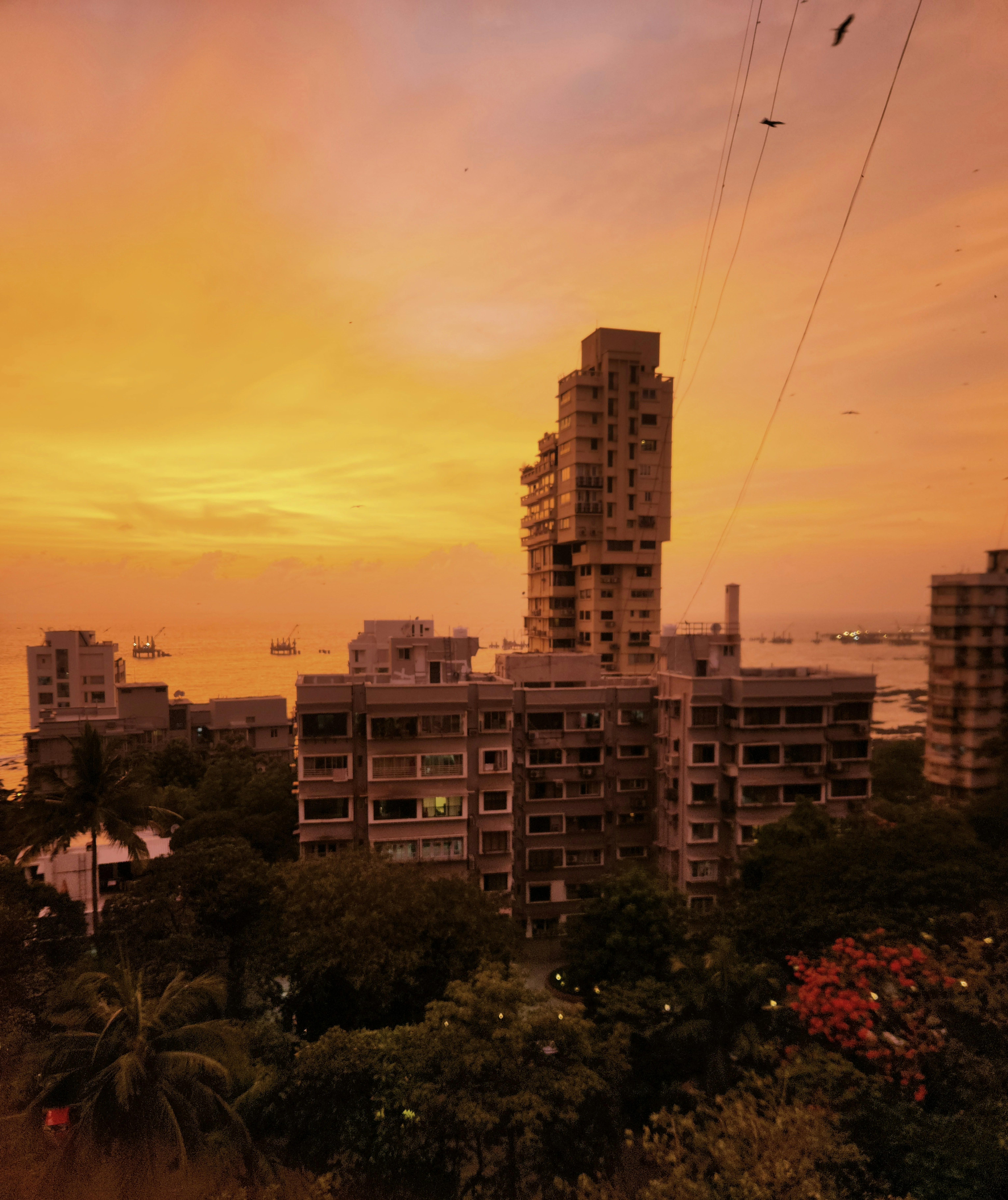 A modern apartment building in India, symbolizing NRI real estate investment