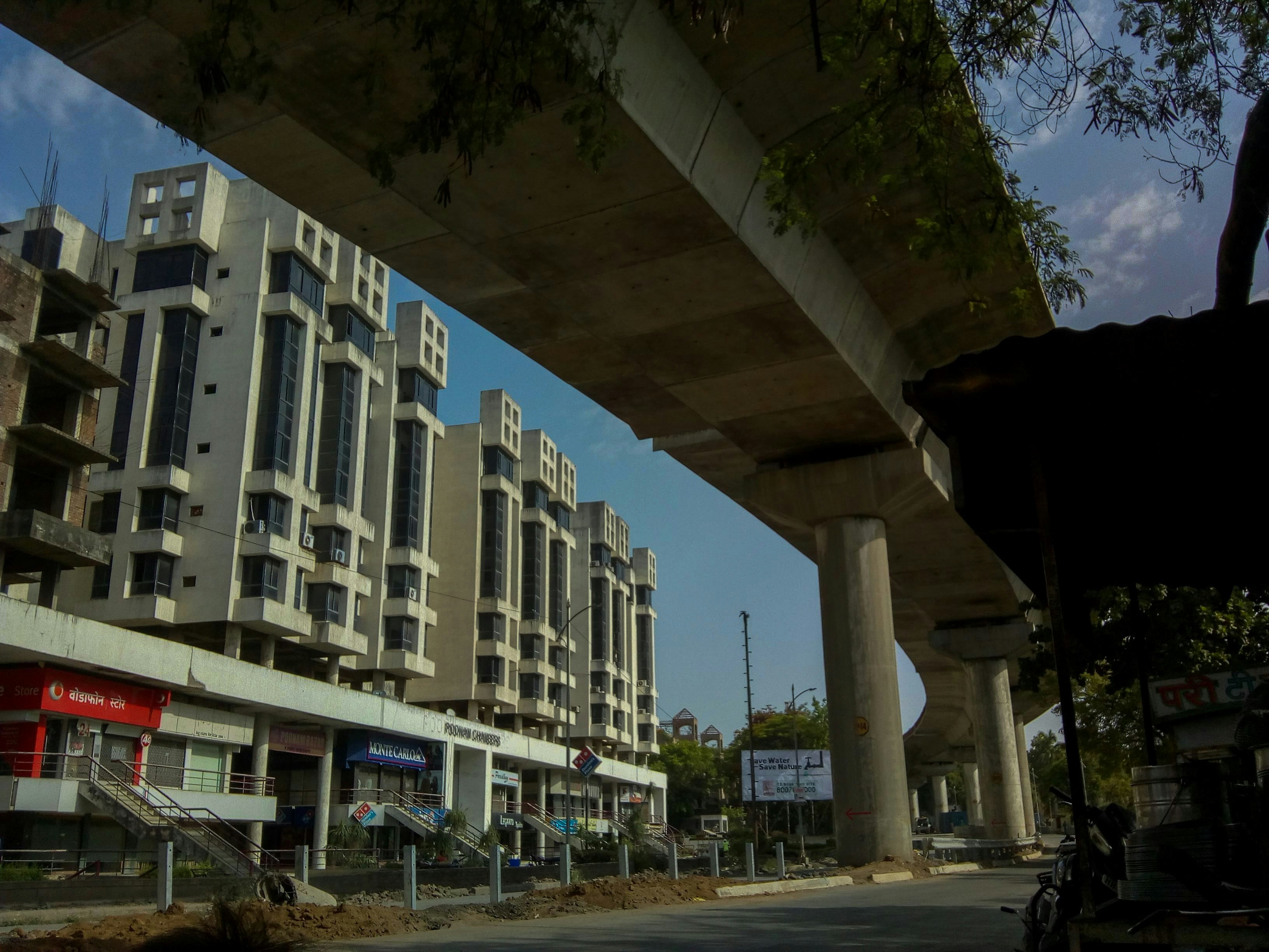 Blueprint and construction helmet on a table