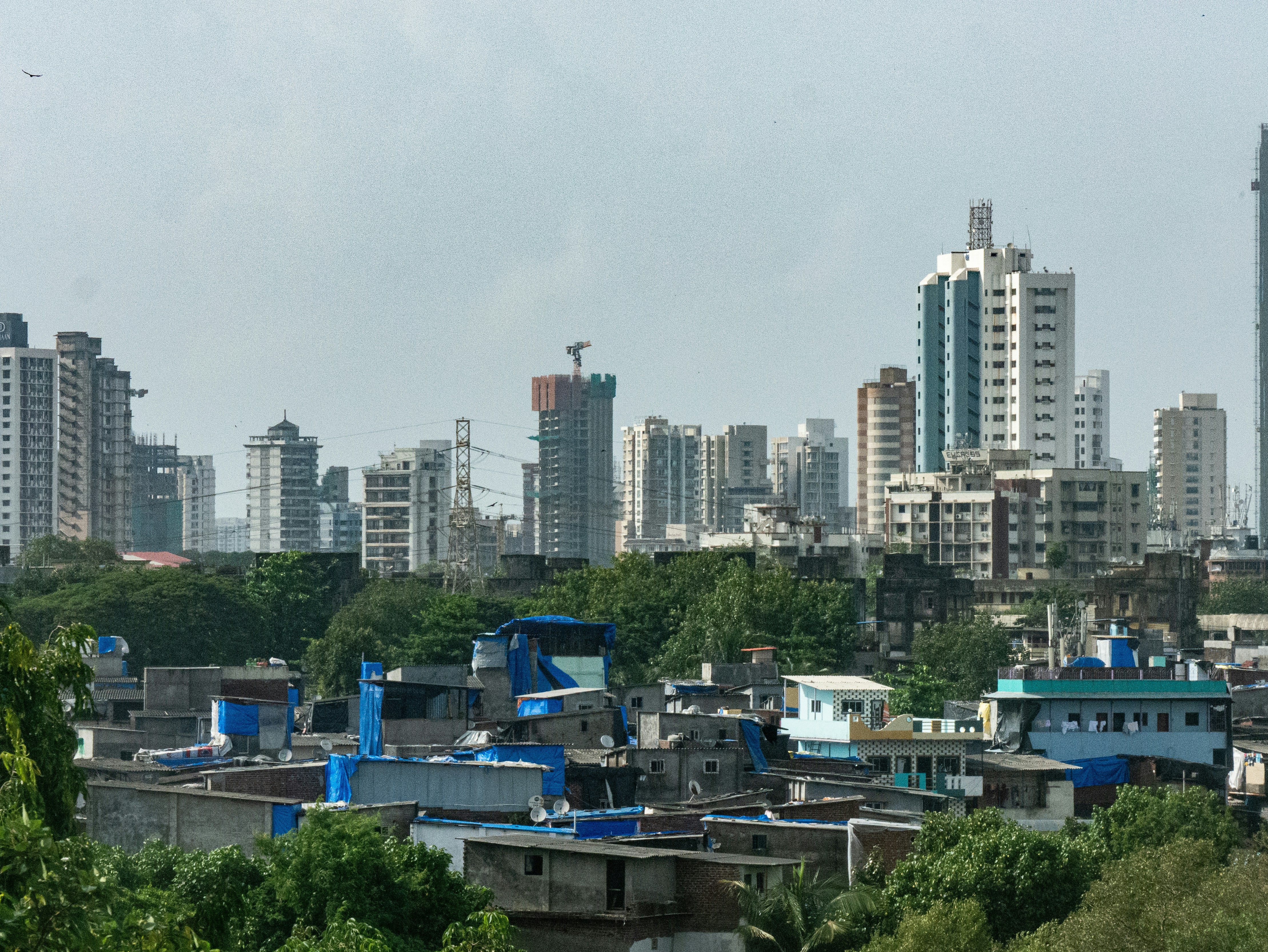 Solar panels under a bright sun, symbolizing India's push towards renewable energy.