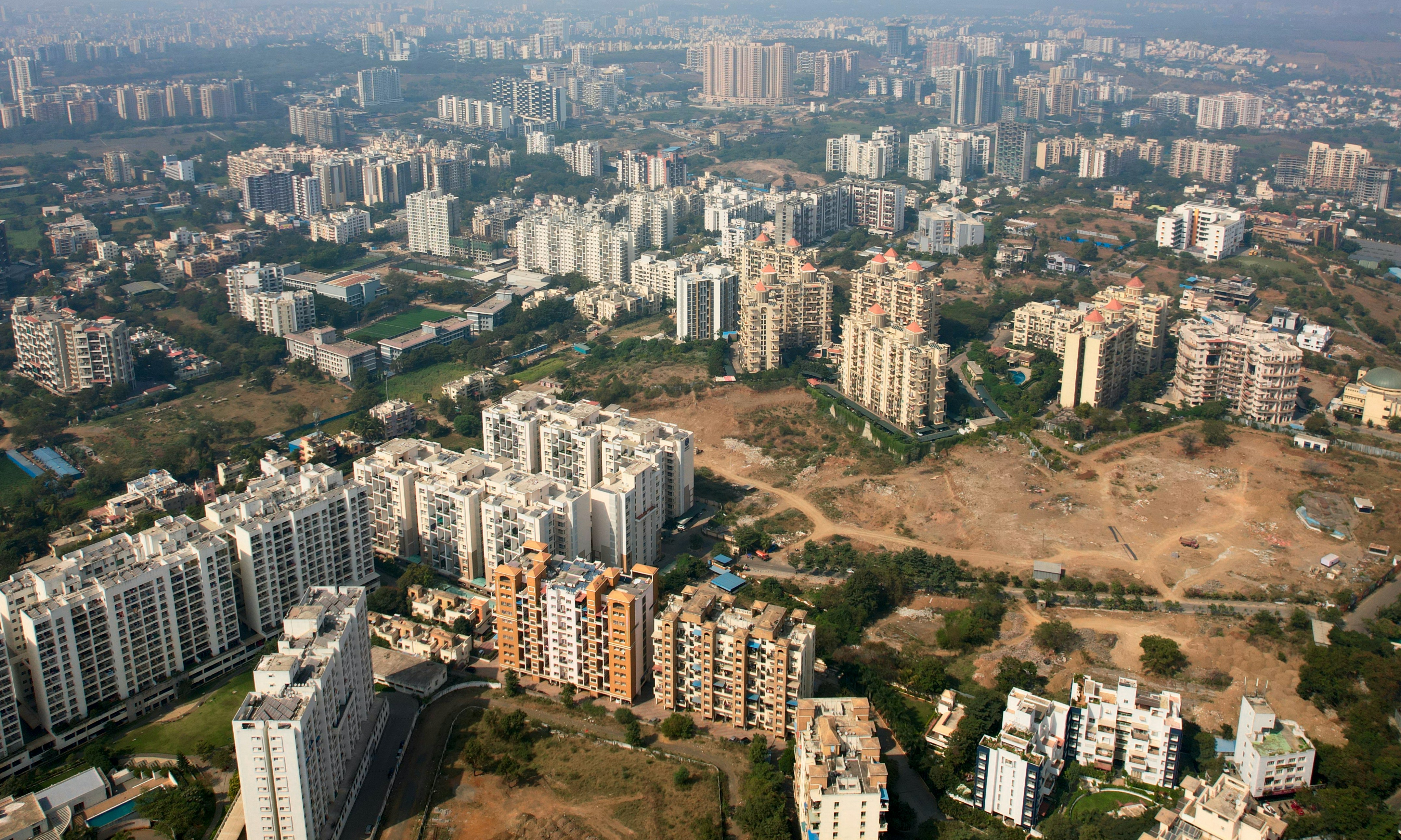 Checking property ownership online in India on a laptop